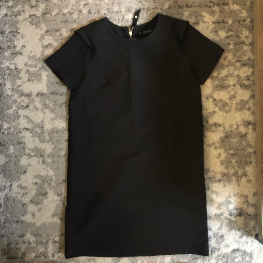 Black dress with exposed zipper on back
